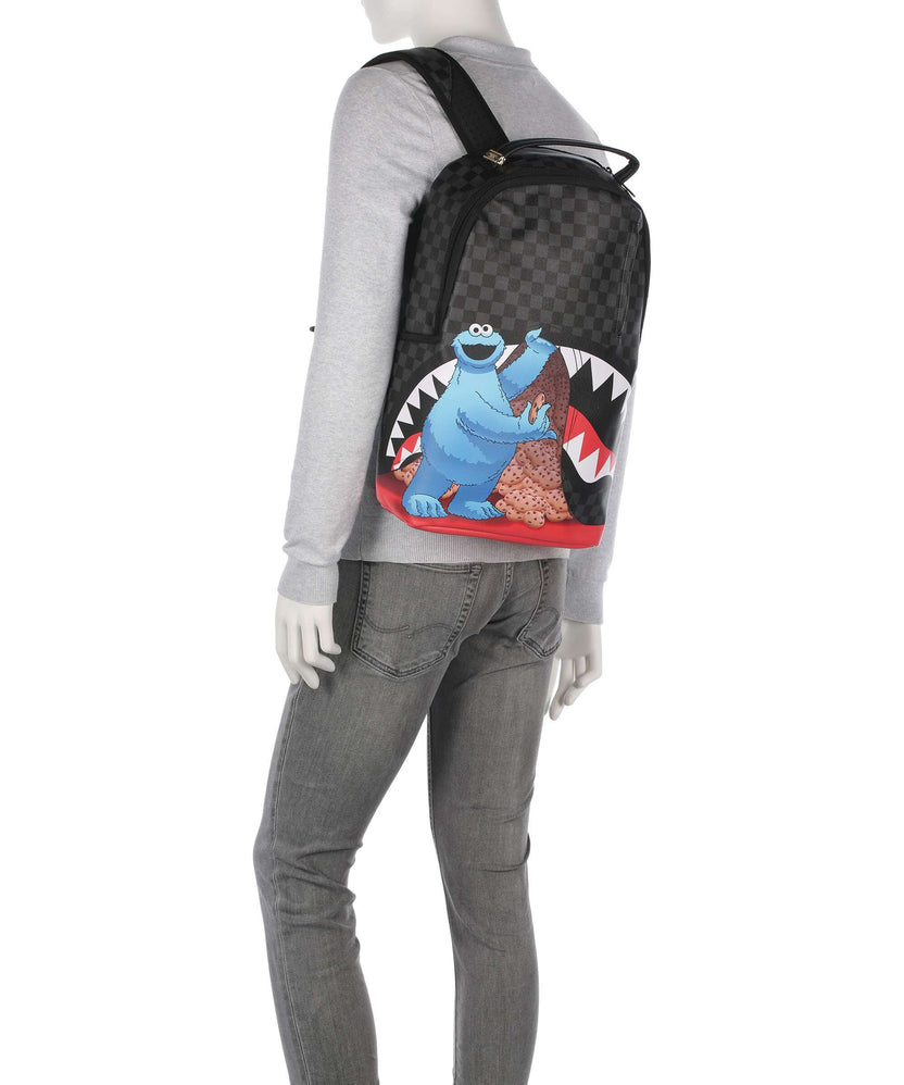 Sprayground Sesame Street Cookie Monster Sneaking a Bite Backpack black