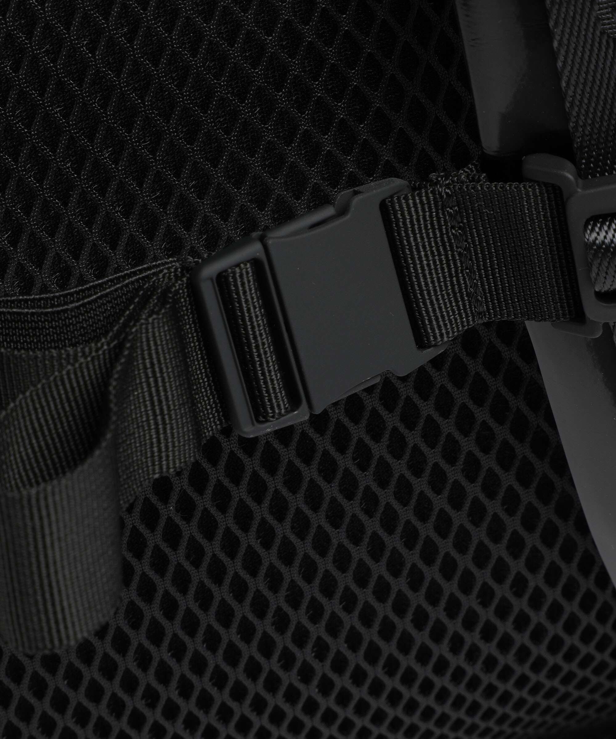 Rains Trail Rolltop backpack night